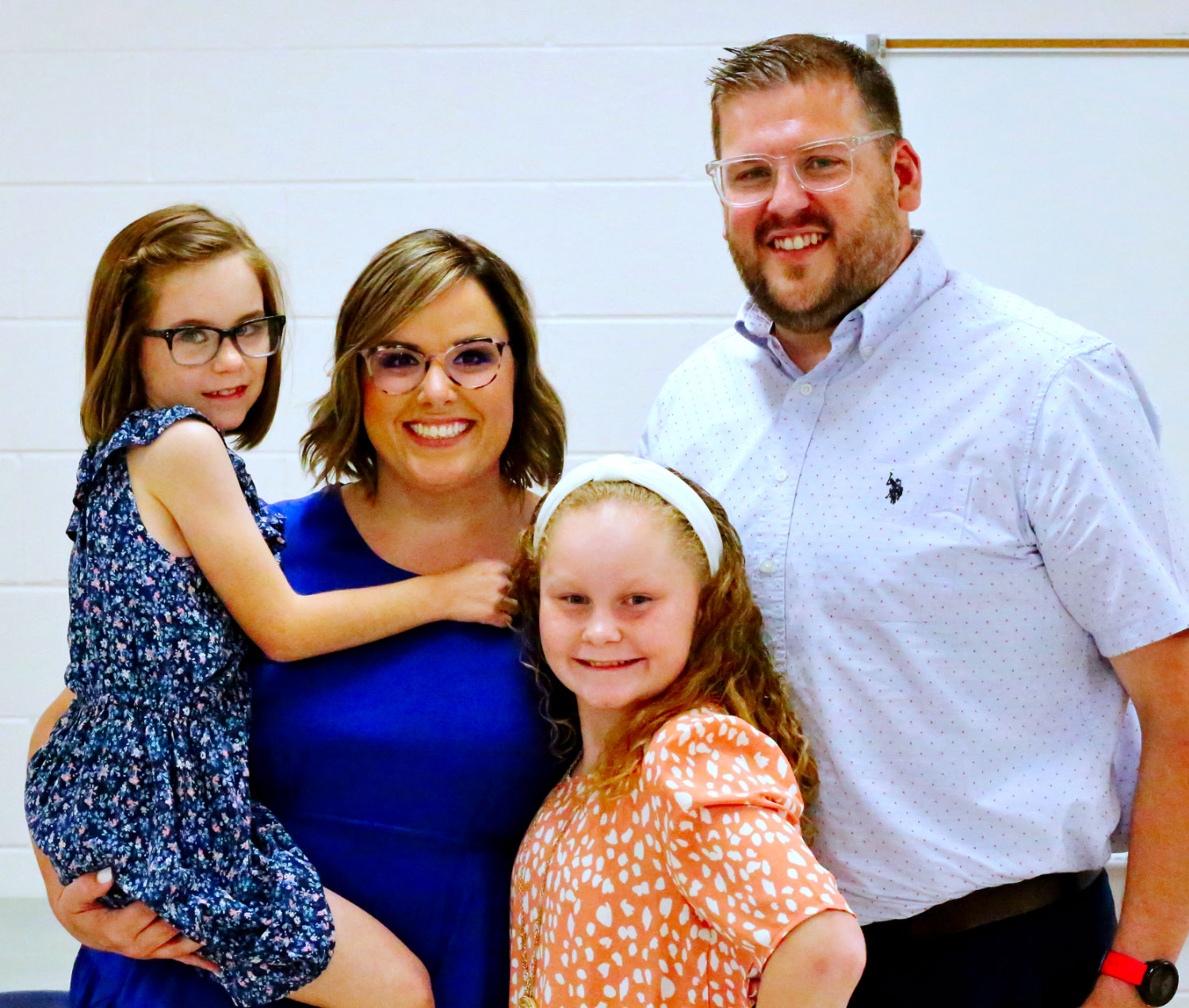 Christopher Massey, with his wife Candace and daughters Emory (10) and Bristol (8), was hired as the Alba-Golden Elementary School Principal at Monday’s school board meeting.